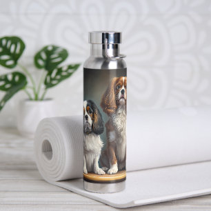 Tricolor und Blenheim Cavalier King Charles Trinkflasche