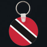 Trinidad und Tabago Schlüsselanhänger<br><div class="desc">Die Flagge von Trinidad und Tobago wurde nach der Unabhängigkeit vom Vereinigten Königreich am 31. August 1962 adoptiert. Rot,  Schwarz und Weiß symbolisieren das Feuer (die Sonne,  die den Mut darstellt),  die Erde (die Widmung darstellt) und das Wasser (die Reinheit und Gleichheit repräsentiert).</div>