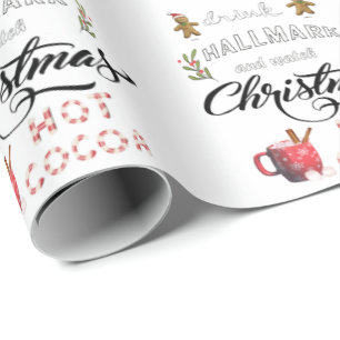 Trinke heiße Schokolade und schaue dir das Weihnac Geschenkpapier