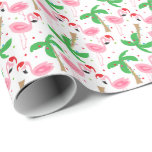 Tropical Beach Christmas Flamingos Birds Geschenkpapier<br><div class="desc">Weihnachtsgeschenk zum Thema Strand mit Flamingos mit Weihnachtsmannmützen. Ornamente und Lichter schmücken die Palmen. Wrap deine Geschenke in warmen Winter jubeln. Sie können das Muster vergrößern oder verkleinern. Klicken Sie auf Anpassen und passen Sie die Größe mit den Plus-/Minusknöpfen an. Copyright Bendel Creative Design LLC Alle Rechte vorbehalten.</div>