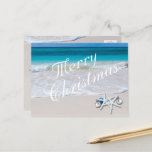 Tropical Mercury Ocean Beach Postcard Feiertagspostkarte<br><div class="desc">Tropische Weihnachtsgrüße,  erschwingliche Postkarte. Passen Sie alle Texte mit dem Ozean und dem Strand Sand als Hintergrundbild an. Rett mit dieser Art von Karte Geld.</div>