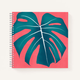 Tropical Monstera Leaf auf rosa Notizbuch