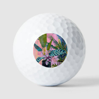 Tropical pink flamingos set against lush green golfball