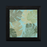 Tropisch verblasste Blätter Erinnerungskiste<br><div class="desc">"Verblasste tropische Blätter II" von Jade Reynolds. Enthält eine Sammlung tropischer Blätter in verblichenem Design.</div>