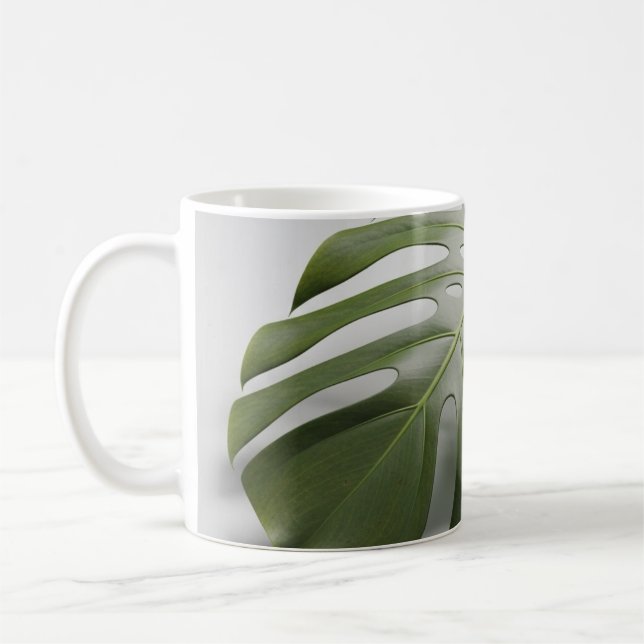 Tropische Eleganz: Monstera Leaf Kaffeetasse (Links)
