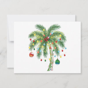Tropische Weihnachtspalme mit Lichtern und Ornam