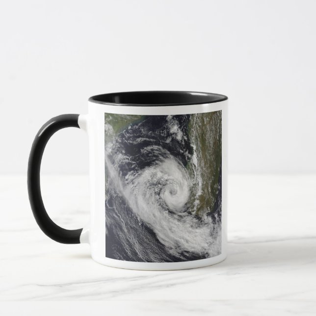 Tropischer Cyclone Izilda Tasse (Links)