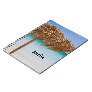 Tropischer Strand mit Strohdach-Schirm Notizblock