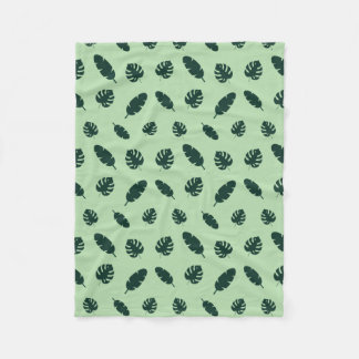 Tropisches Monstera- und Palmblatt-Nahtlosmuster Fleecedecke