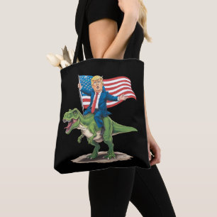Trump reitet auf Dinosaurier T Rex USA Amerikanisc
