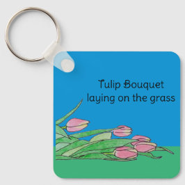 Tulpenstrauß auf dem Gras liegend Schlüsselanhänger