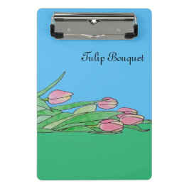 Tulpenstrauß liegt mini klemmbrett