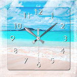 Türkisblaues Foto am tropischen Sandstrand von Haw Quadratische Wanduhr<br><div class="desc">Lassen Sie sich von dem frisch salzhaltigen Geruch der Meeresluft erinnern, wann immer Sie die Zeit auf dieser atemberaubenden, lebhaften Foto-Wanduhr Karo haben. Entdecken Sie die Einsamkeit eines leeren hawaiianischen Strandes. Ihre Wahl einer rund oder quadratisch gedrehten Uhr. Macht ein großartiges Geschenk für die Hauswärmung! Sie können diese Wanduhr leicht...</div>