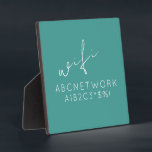 Türkisblaues WLAN-Passwort-Zeichen mit Easel Stand Fotoplatte<br><div class="desc">Behalt deine Gäste mit diesem stylishen türkisfarbenen WiFi-Passwort-Zeichen verbunden. Der fette, weiße Text auf türkisfarbenem Hintergrund ist leicht zu lesen und ergänzt jede Wohngestaltung. Dieses Schild ist mit einem Ständer aus Stahl und einem Durchmesser von 5, 25 x 5, 25 Zoll ideal für die Darstellung auf einem Schreibtisch, Regal oder...</div>