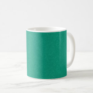 Türkise texturierte Oberfläche mit subtilen Wirbel Kaffeetasse