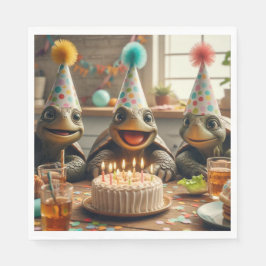 Turtles celebrating birthday with cake and hats serviette