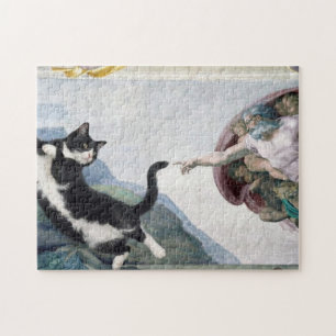 Tuxedo-Katze berührt die göttliche Pfote           Puzzle
