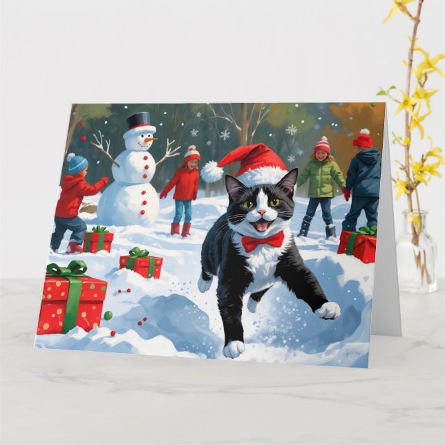Tuxedo Katze läuft im Schnee mit Weihnachtsmütze Karte (Gelbe Blume)