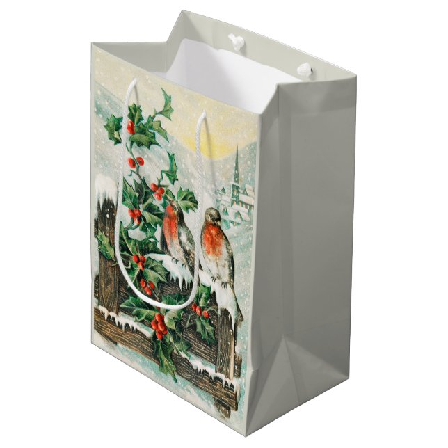 Two robins on a fence in the snow  mittlere geschenktüte (Vorderseite Schrägansicht)