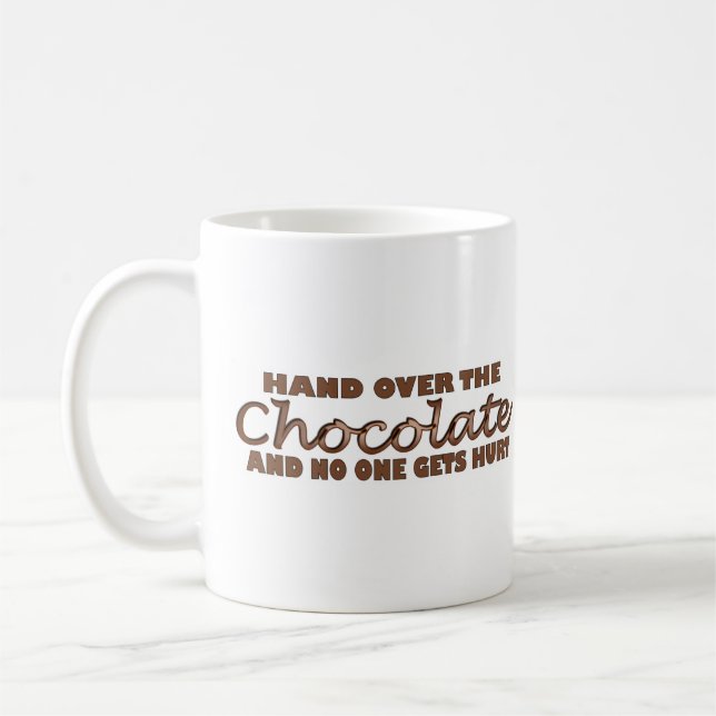 Überreichen Sie die Schokolade Tasse (Links)