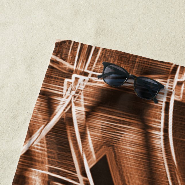 Überschneidende Kurven in Bandformen, braunes Reli Strandtuch (Beispiel)