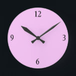 Uhr der Wand in Rosa<br><div class="desc">Diese rosa Wanduhr wird mit den passenden Kissen,  Serviertabletten,  Bilderrahmen und Lichtschaltern in diesem Laden in derselben Kaugummi-Rosa-Farbe fabelhaft aussehen.</div>