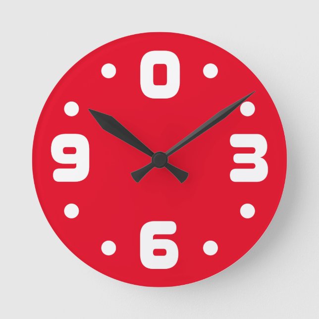 Uhr mit den Zahlen Null, drei, sechs und neun. (Vorderseite)