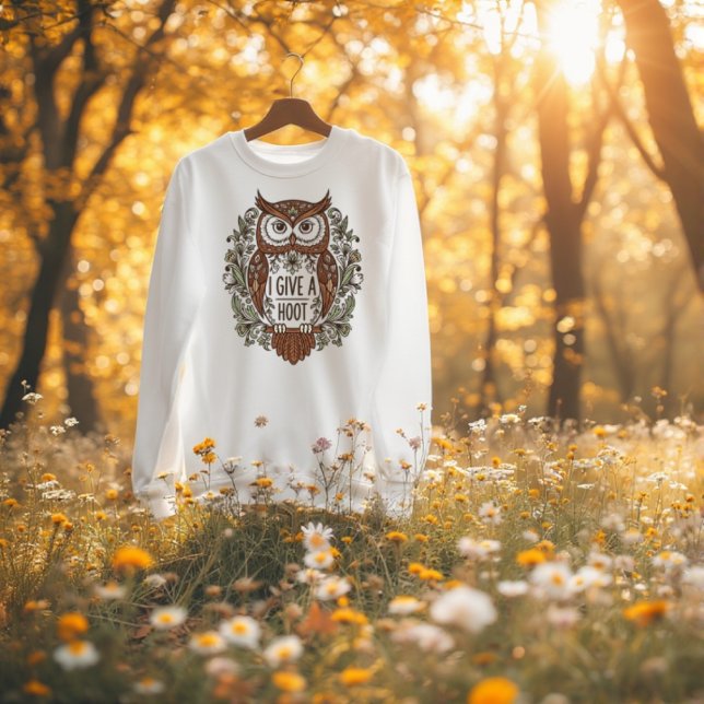 Uhu mit Blume T-Shirt (Brown owl with flowers design T-Shirt
A wise brown owl with a delicate flower design and the sentime)