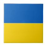 Ukraine-Flagge Fliese<br><div class="desc">Die ukrainische Flagge ist ein horizontales Bicolor . Die verwendeten Farben in der Flagge sind blau,  gelb. Der Anteil der ukrainischen Flagge beträgt 2:3. Die Flagge der Ukraine wurde 1992 adoptiert. Die erste Verwendung des aktuellen Flagdesigns erfolgte 1848. Die letzte Änderung am aktuellen ukrainischen Flaggendesign erfolgte 1918.</div>