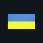ukrainische Flagge, ukrainische Slawin Ukraini С л Leinwanddruck<br><div class="desc">Die Farben der ukrainischen Flagge, blau und gelb, sind seit Jahrhunderten über ein Land geflogen, das reich an Geschichte und Geist ist. Blau repräsentiert den riesigen ukrainischen Himmel, während Gelb die goldenen Weizenfelder symbolisiert, die sich über die fruchtbaren Ebenen erstrecken. Dieses einfache, aber mächtige Symbol ist zu einem Leuchtfeuer der...</div>