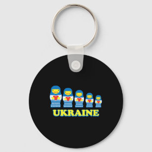 Ukrainische Matrjoschka-Puppen halten Herzen Schlüsselanhänger