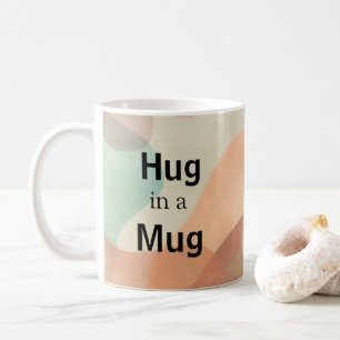 Umarmen in einer Tasse Kaffee-Tasse