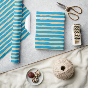 Umhüllungspapier im Blau- und Goldwellenstil Geschenkpapier