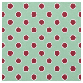 Umrissene dunkelrote Tupfen auf hellgrünem Gewebe Stoff