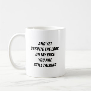 Und doch trotz des Ausdrucks auf meinem Gesicht re Kaffeetasse