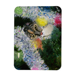 Und eine Katze in einem Weihnachtsbaummagazin Magnet