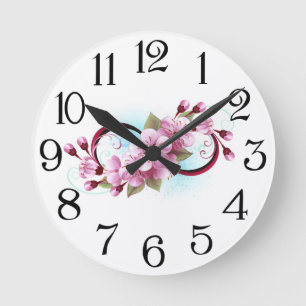 Unendlichkeit mit Sakura Blossom-Blume Runde Wanduhr