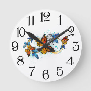 Unendlichkeit von Monarchfaltern Runde Wanduhr