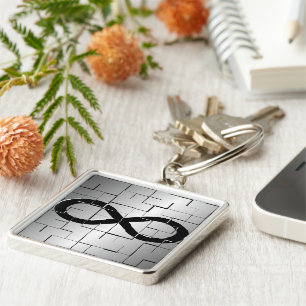 Unendlichkeits-Symbol im Labyrinth-abstrakten Schlüsselanhänger