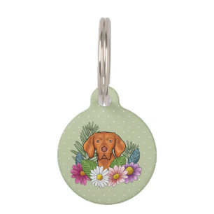 Ungarische Vizsla und farbenfrohe Sommer-Blume Grü Haustiermarke