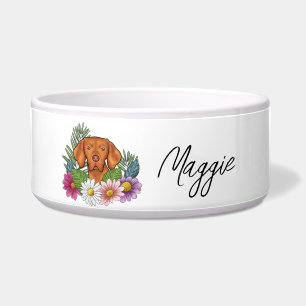Ungarischer Vizsla mit farbenfrohen Blumen und Nam Napf