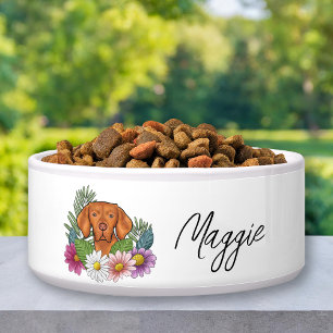 Ungarischer Vizsla mit farbenfrohen Blumen und Nam Napf