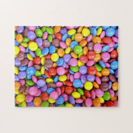 Unmögliche Jigsaw-Puzzle mit farbenfrohen Süßigkei Puzzle