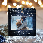 Unser erstes Verlobtes Foto mit blauen Holzleuchte Keramikornament<br><div class="desc">Unsere ersten Weihnachten Verlobten doppelseitiges Foto Ornament - Front & Back Fotos,  Namen auf der Rückseite - Rustikales Land Blue Wood und String Lights</div>