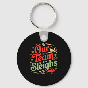 Unser Team macht die Weihnachtsrenne von Santa's A Schlüsselanhänger