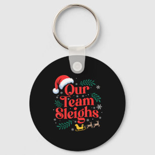 Unser Team macht Weihnachten dem Weihnachtsmann-Re Schlüsselanhänger