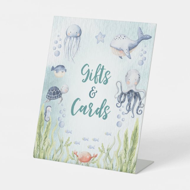 Unter der Meeresdusche verschenkt das Schild Pedes (Vorderseite)