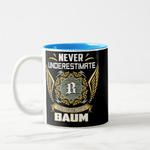 Unterschätze niemals die Macht eines Baums Zweifarbige Tasse