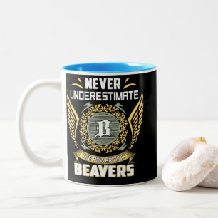 Unterschätze niemals die Macht eines Bibers Zweifarbige Tasse