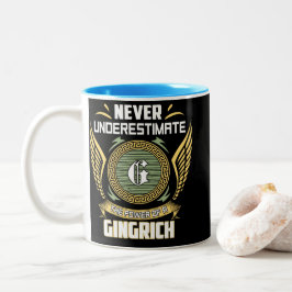 Unterschätze niemals die Macht eines Gingrich Zweifarbige Tasse